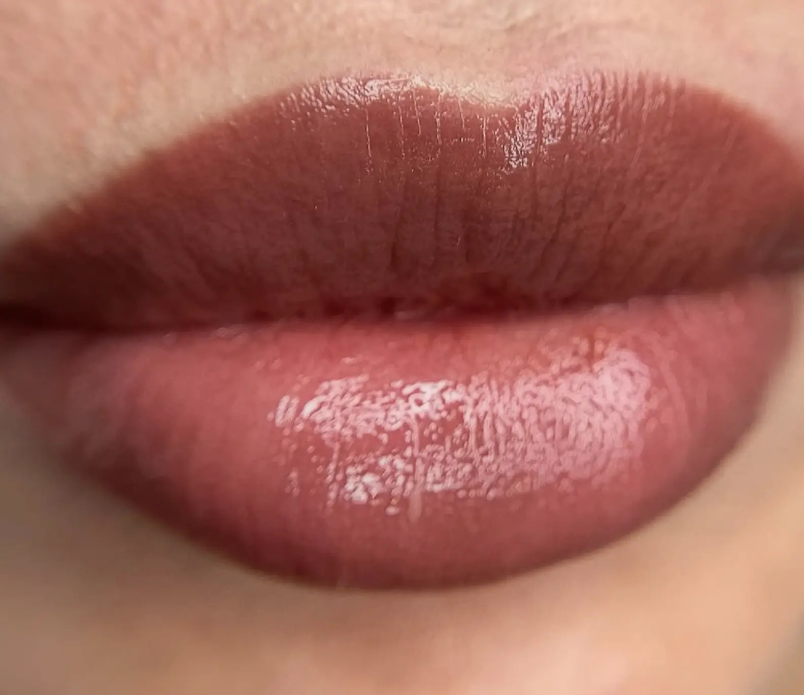 What is the ghosting stage of Lip tattoo?